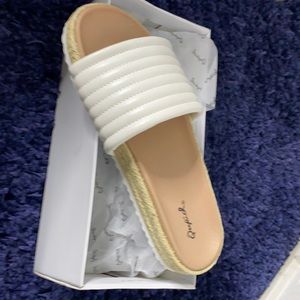 Adorable white flip flops